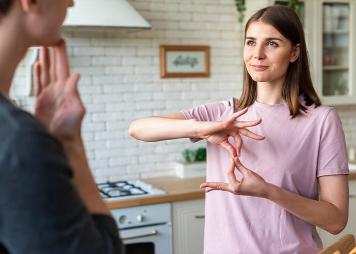Aide et accompagnement [de personnes avec un handicap auditif]
